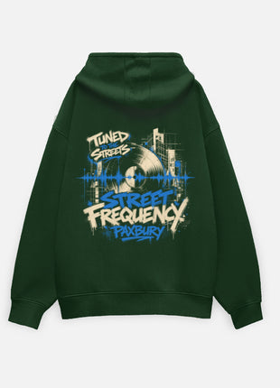 Exact original Street Frequency bottle green oversized hoodie back artwork with vinyl record, city outlines, electric-blue music graphic and large STREET FREQUENCY typography