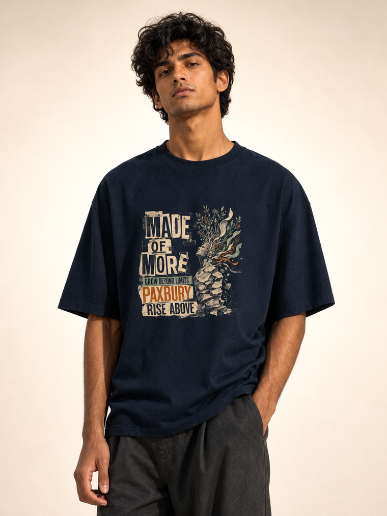 Indian male model wearing PAXBURY Made of More Navy Blue UC22 relaxed unisex T-shirt; front MADE OF MORE botanical distressed graphic
