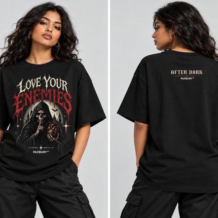 PAXBURY Love Your Enemies oversized black graphic T-shirt on fit female model, front and back views