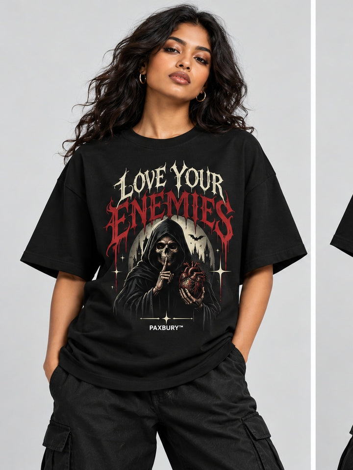 PAXBURY Love Your Enemies oversized black graphic T-shirt on fit female model, front and back views