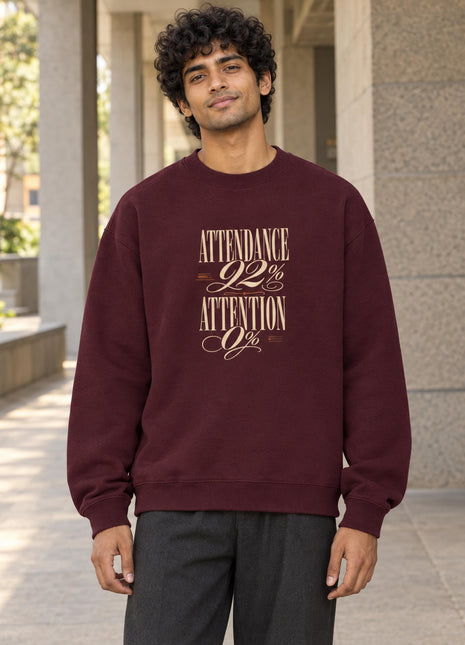 Indian male wearing Attendance 92% Attention 0% maroon oversized crewneck sweatshirt with original-inspired cream typography