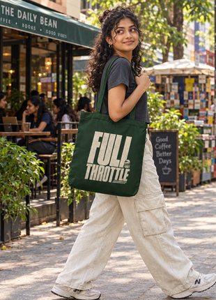Bottle Green Full Throttle tote large type front carried by Indian college-age woman at urban cafe