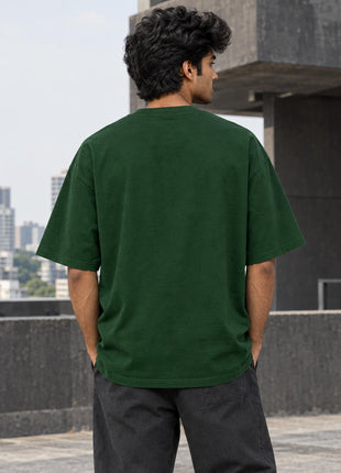 Indian male model showing plain unprinted bottle-green back of the Heart of the Dragon UC22 T-shirt