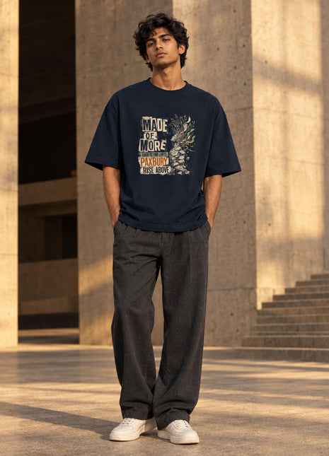 Indian male styling view of Made of More navy oversized graphic T-shirt with original-inspired distressed artwork