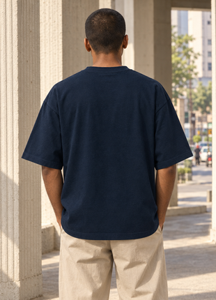 Kittl-made PAXBURY No Skips navy oversized UC22 T-shirt on different Indian male model; correctly plain unprinted back