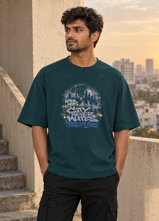 Kittl Indian male editorial mockup wearing PAXBURY After Hours petrol blue UC22 oversized T-shirt with source-matched front art