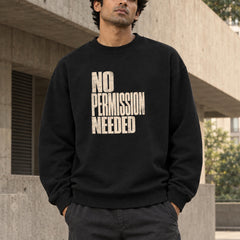 Indian male wearing Rebel State No Permission Needed black oversized crewneck sweatshirt, bold distressed cream front lettering