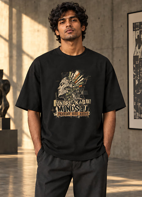 Unbreakable Mindset black UC22 oversized graphic T-shirt on Indian male model, illustrated classical profile and distressed lettering